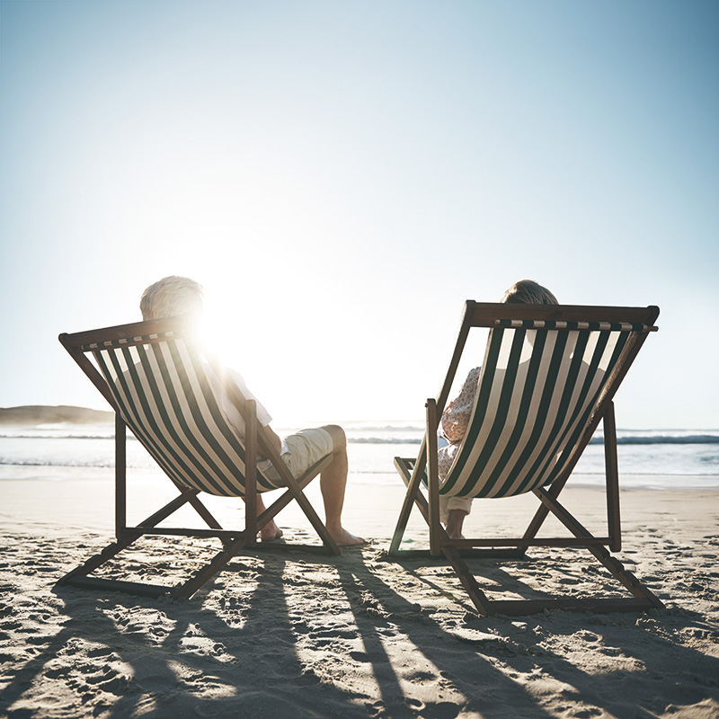 retirement couple on beach