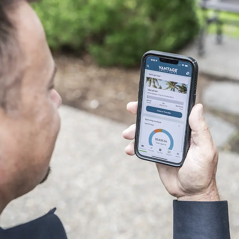 Member looking at digital banking app on phone