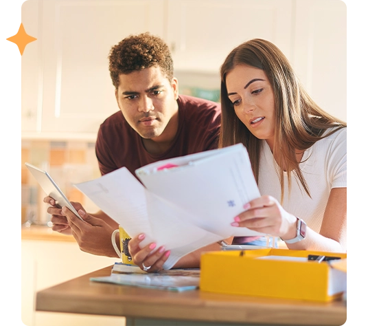 Couple reviewing investments