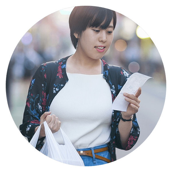 Member looking at grocery receipt