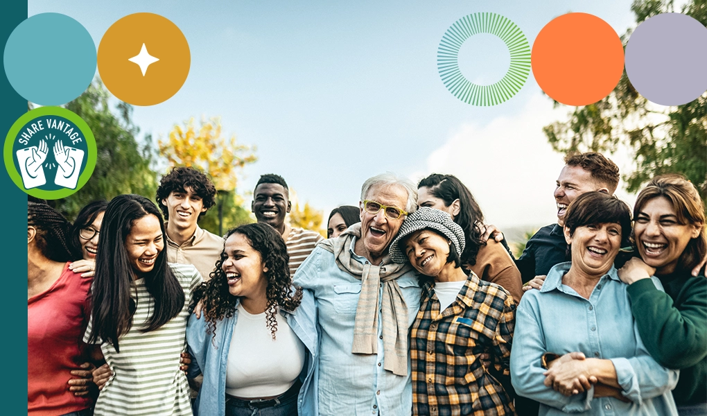 Group of people hugging and laughing