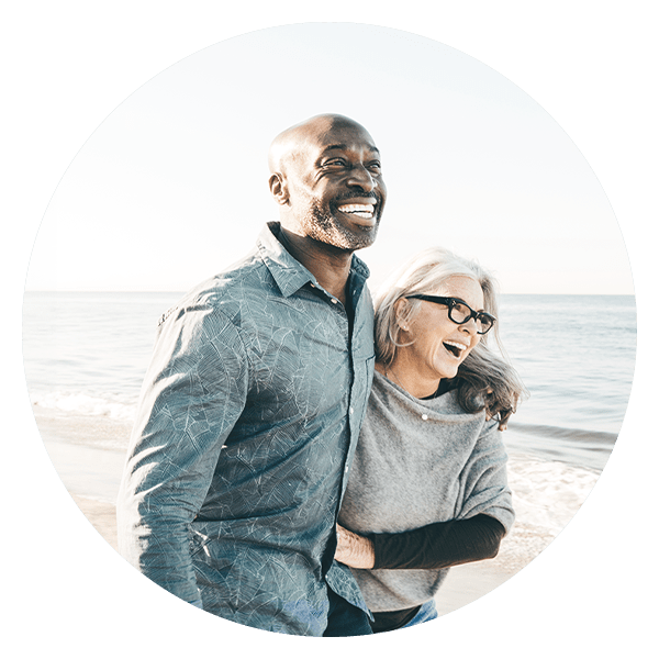 A couple walking on the beach