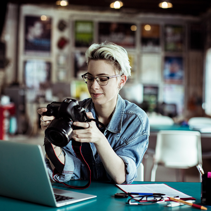 female photographer looking at camera